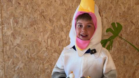 Cooper seen dressed in seagull costume