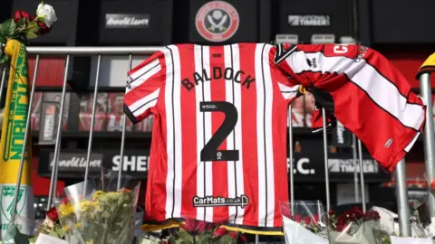 George Baldock tributes at Bramhall Lane