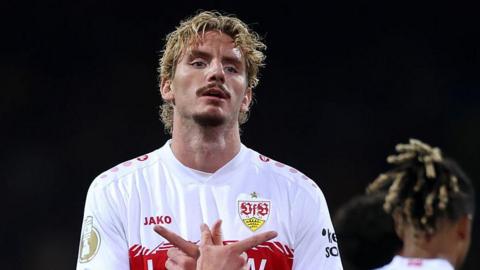 Nick Woltemade celebrates after scoring for VFB Stuttgart against Eintracht Braunschweig