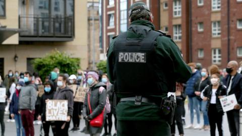 Protesters gathered in Custom House Square in Belfast on 6 June last year