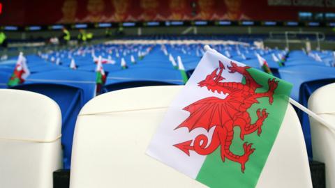 A Welsh flag on a stadium seat