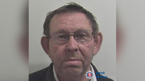 A police mugshot of child rapist Michael Link 