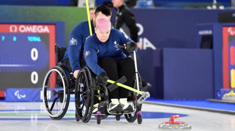 Great Britain wheelchair curler Jo Butterfield in action