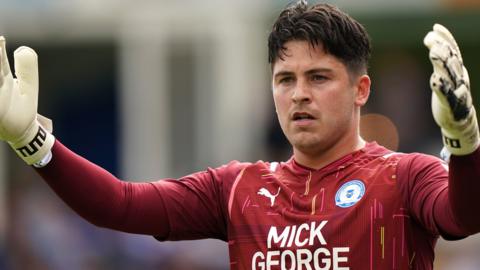 Christy Pym has made 94 first team appearances for Peterborough since signing from Exeter City in 2019