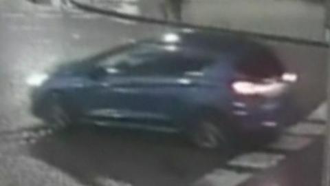 A blue Ford Fiesta that was used by the gunmen who attacked John Caldwell