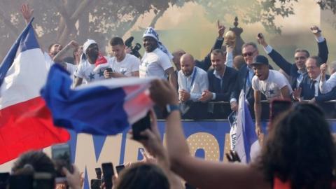 France's football team parades the World Cup in Paris. Photo: 16 July 2018