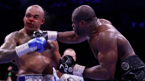Daniel Dubois lands a punch on a bloodied Fabio Wardley