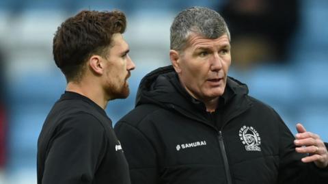 Henry Slade (left) talks to Exeter boss Rob Baxter