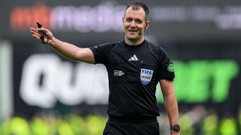 Referee Don Robertson awards a free-kick during the Scottish Premiership match between Hibernian and Heart of Midlothian