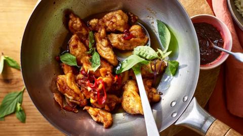 Stir fry chicken and chilli in a bowl