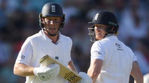 England batters James Rew (left) and Jordan Cox (right) run between the wickets