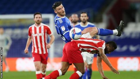 Kieffer Moore challenging for the ball
