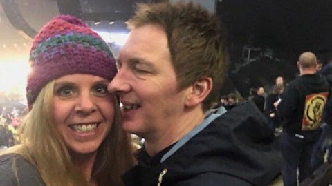 Liz Greenwood with her partner Ian at an Oasis concert before the band broke up