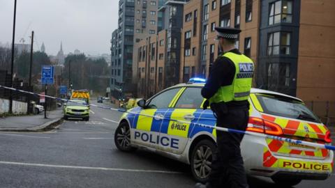 Police at the scene on Broad Street in Sheffield city centre.