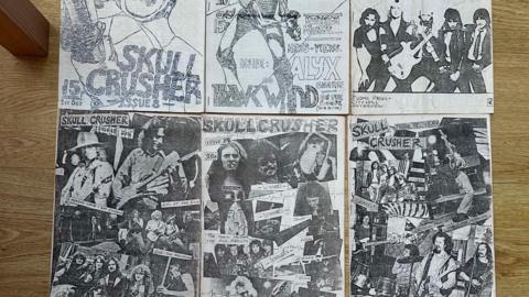 A collage of black and white fanzine covers.