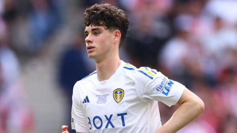 Archie Gray in action for Leeds