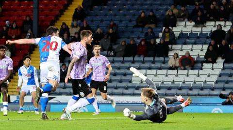 On-loan Brighton defender Eiran Cashin nips in to score his first Blackburn goal