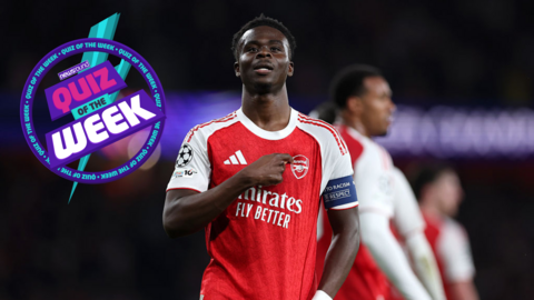 Bakayo Saka points towards the arsenal logo on his red and white shirt, the Newsround quiz of the week logo is to his left