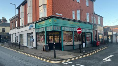 A green new shop front on Cupcakery business on Gerard Street in Ashton-in-Makerfield.
