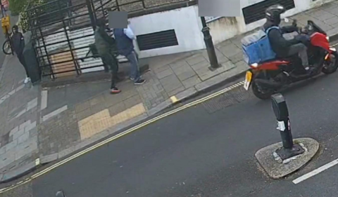 Man gets robbed in street caught on CCTV