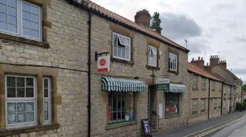 A Google Street View image of the Post Office in Helmsley 