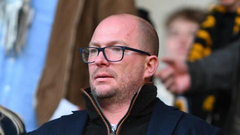 Tom Cartledge pictured while in the stands at a Nottingham Forest game at Wolves.