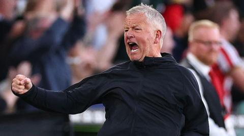 Chris Wilder celebrates a Sheffield United goal last season