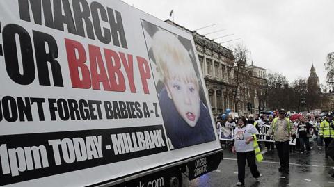 Members of the campaign for "Justice for Baby P" march towards Trafalgar Square, London after handing submitting a petition at Number 10 Downing Street on December 10, 2008 demanding action on the country's care system to prevent future child deaths, following the death of a baby after a lifetime of abuse. 