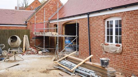 An extension being constructed outside a house in the UK 