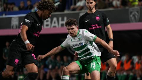 TNS' Ben Clark in action against Sabah
