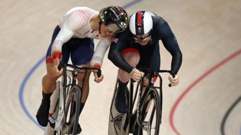 Kaiya Ota of Team Japan and Jack Carlin of Team Great Britain compete during Men's Sprint Quarterfinals on day thirteen of the Olympic Games Paris 2024 at Saint-Quentin-en-Yvelines Velodrome