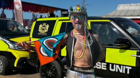 A man in a funky outfit. 