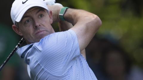 Rory McIlroy stares after hitting a tee-shot during the final round of the Masters at Augusta National