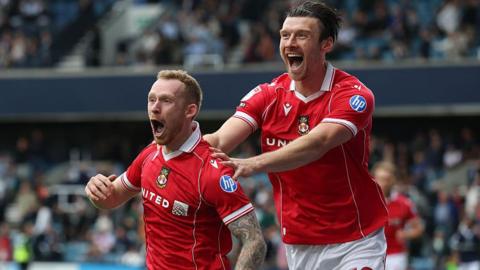 Lewis O'Brien (left) and Kieffer Moore celebrate 