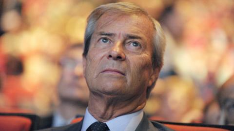 In this file photograph taken on June 24, 2014, then vice-chairman of the Vivendi supervisory board Vincent Bollore looks on during a company general meeting in Paris