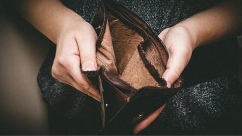 Woman with empty purse