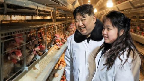 North Korean leader Kim Jong Un and his daughter Kim Ju Ae visit the Kwangchon Chicken Farm near Pyongyang, North Korea, January 7,