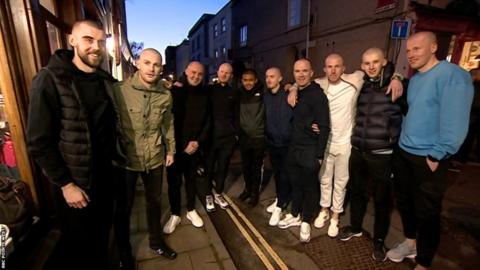 Bristol Rovers players after having their heads shaved