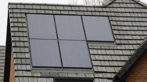 A general view of solar panels installed on a home's roof.