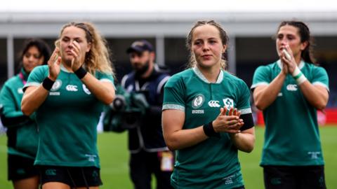 Irish players applaud fans after their World Cup exit