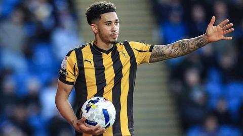 Port Vale full-back Jordan Lawrence-Gabriel holds the ball as he prepares to take a thrown-in