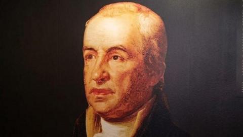 A display sign featuring John Dunlap