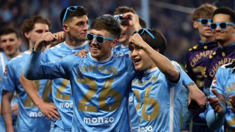 Josh Eccles celebrates with Tatsuhiro Sakamoto