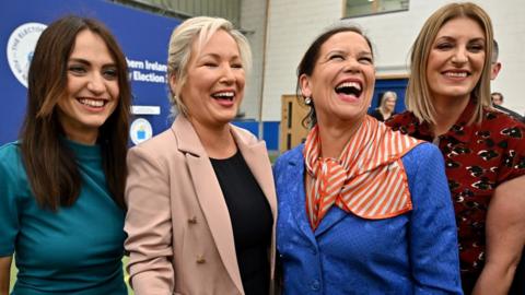 MAGHERAFELT, NORTHERN IRELAND - MAY 07: Sinn Féin northern leader ,Michelle O'Neill and Mary Lou McDonald, Sinn Féin leader are seen with candidates and activists at the declaration in Northern Ireland's Election at the Meadowbank count on May 07, 2022 in Magherafelt , United Kingdom. This election will elect 90 members to the Northern Ireland Assembly. It will be the seventh election since the Assembly was established in 1998. (Photo by Jeff J Mitchell/Getty Images)