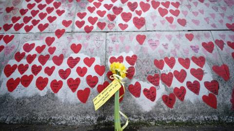 A bouquet of flowers at the The National Covid Memorial Wall in London, on the second National Day of Reflection