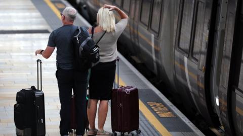 Couple on Paddington Station during strike on July 29