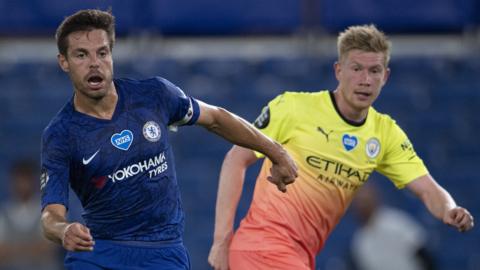 Chelsea defender Cesar Azpilicueta (left) and Manchester City midfielder Kevin de Bruyne (right) challenge for the ball during a Premier League match