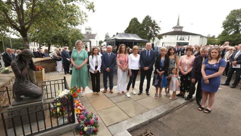 The open-air service was held in the centre of the village on Sunday