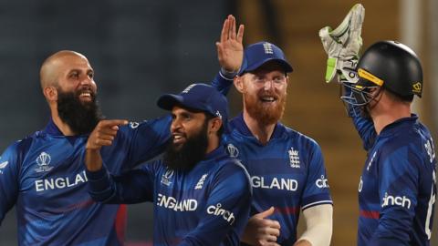 England players celebrate a wicket