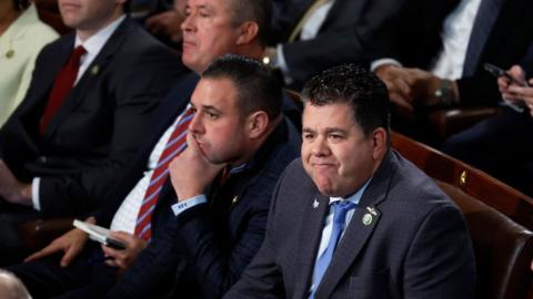 Don Bacon (left), Anthony D'Esposito (centre) and Nick LaLota (right) sit in the House chamber